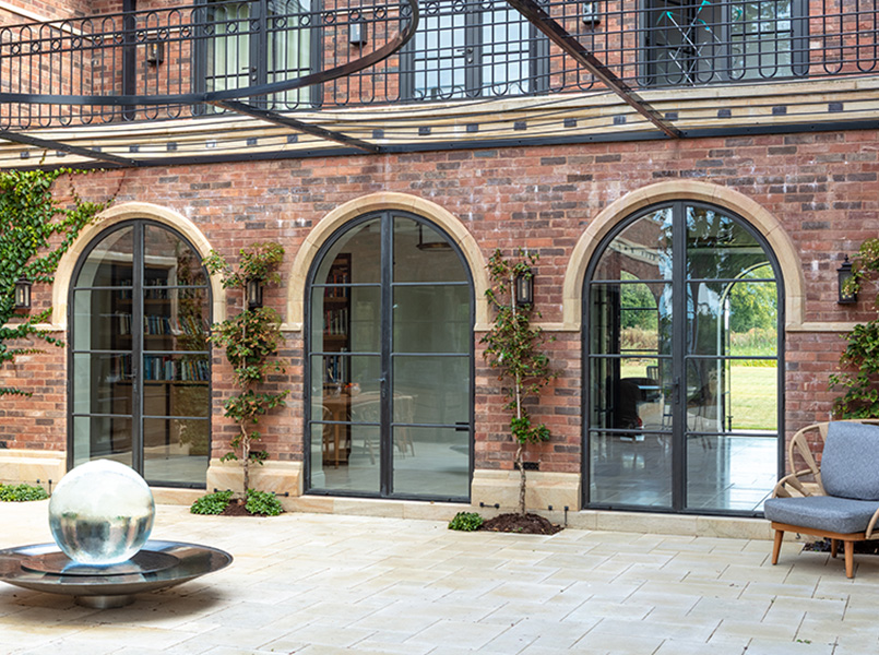 Metal arched doors article