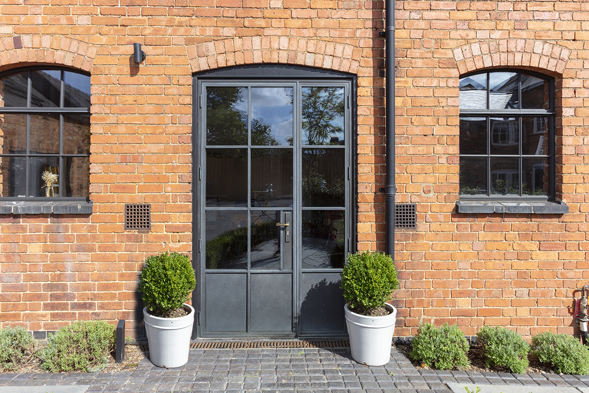 bronze door with opening side door