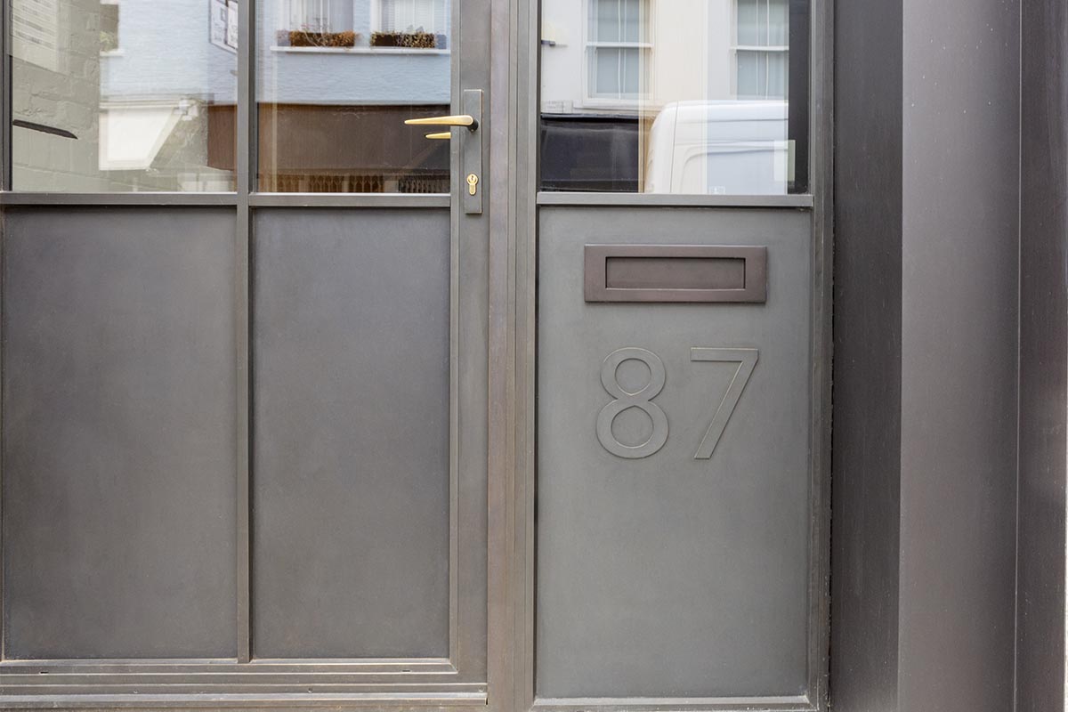 panelled door with house number