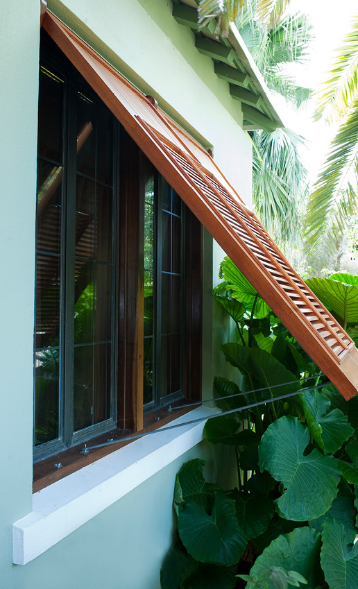 Bronze window with shutters