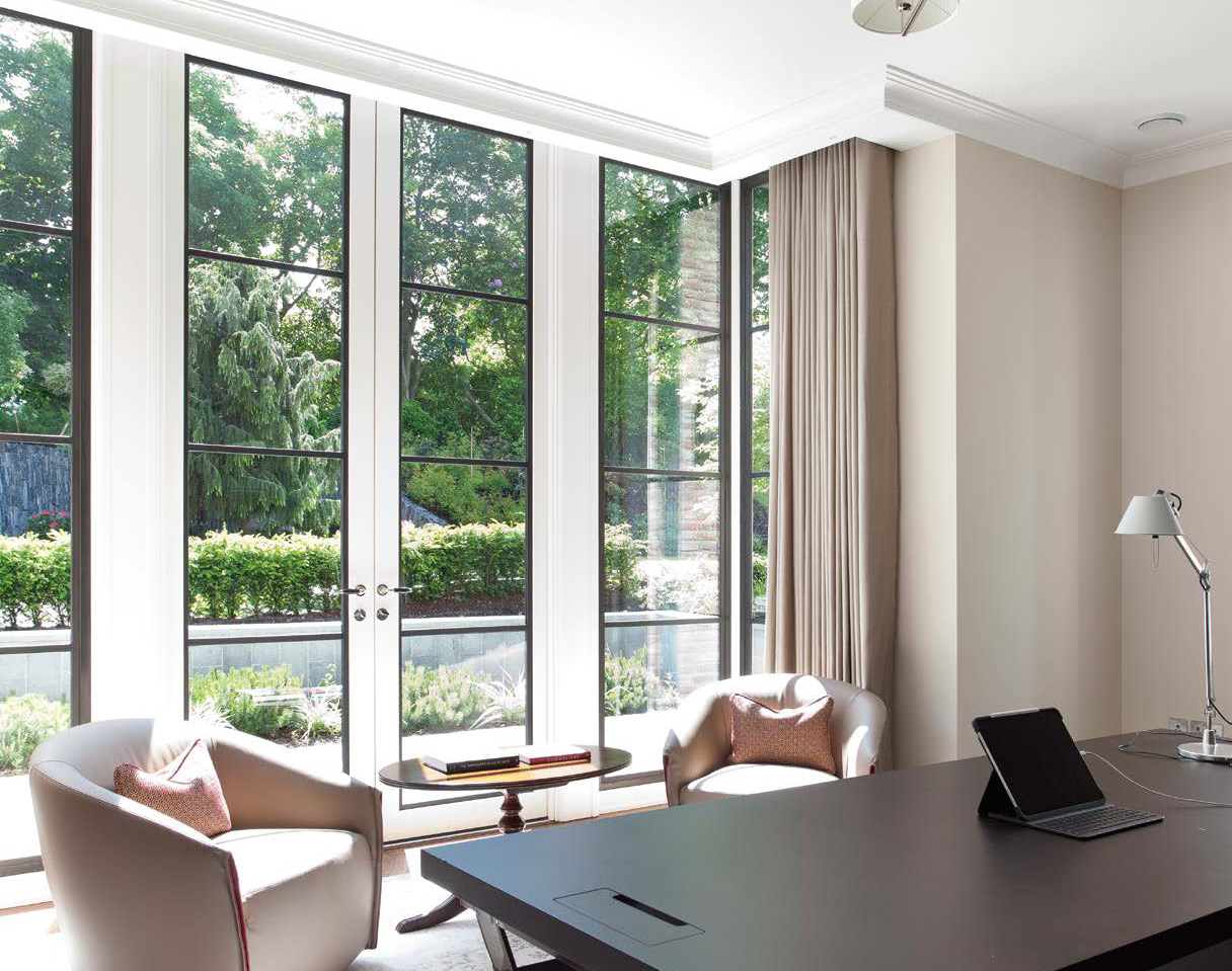 Home office with bronze doors