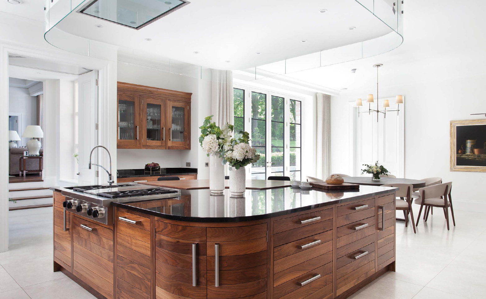 Open plan kitchen with bronze windows