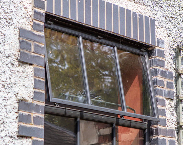 Open bronze window