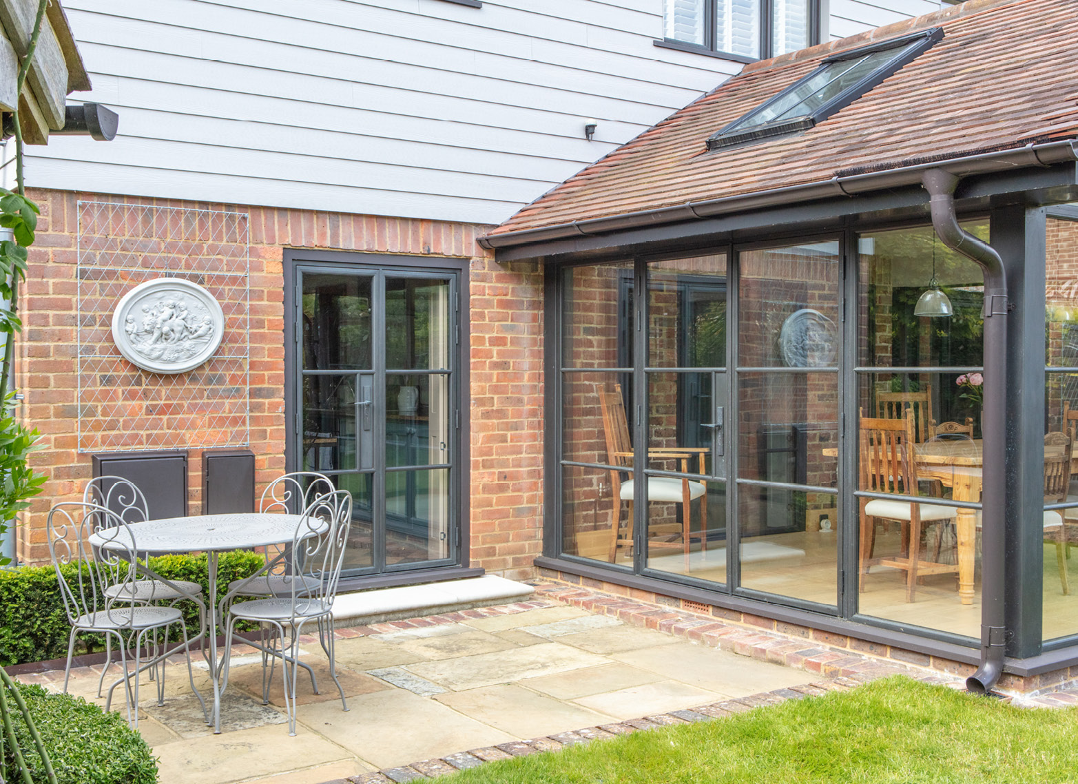 Bronze doors on garden room