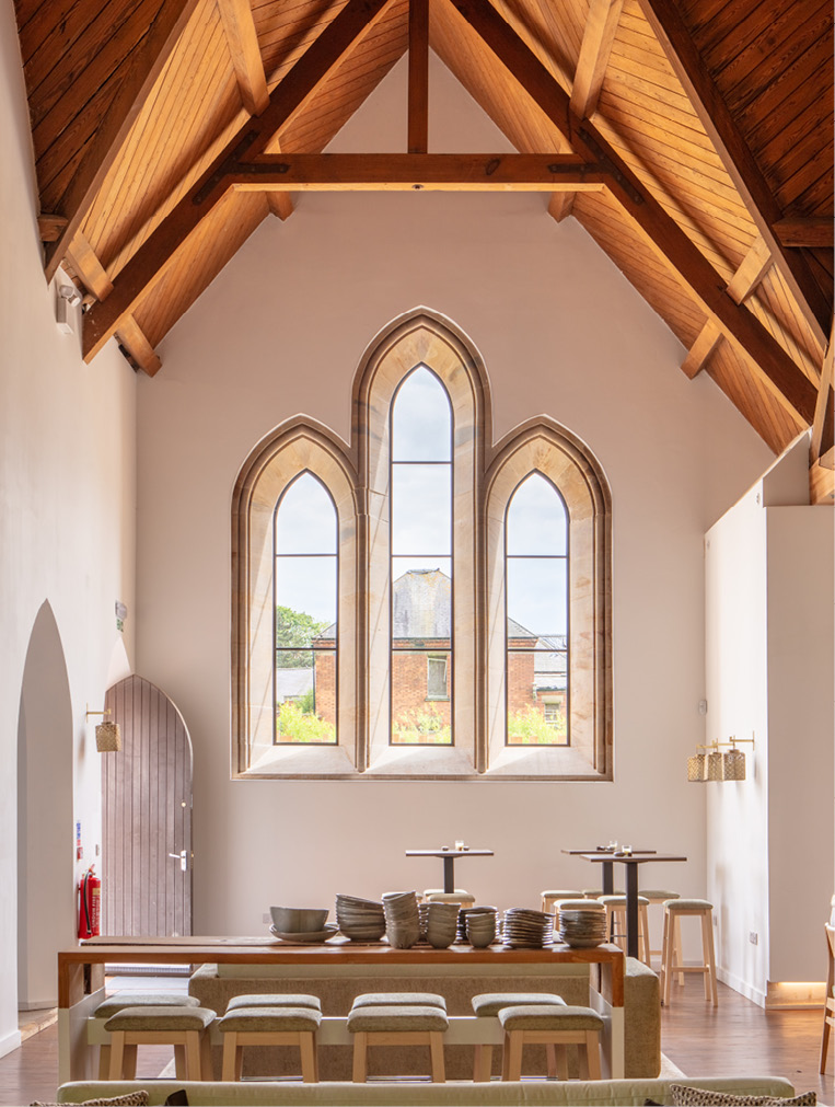Bronze windows at the old chapel cafe entrance