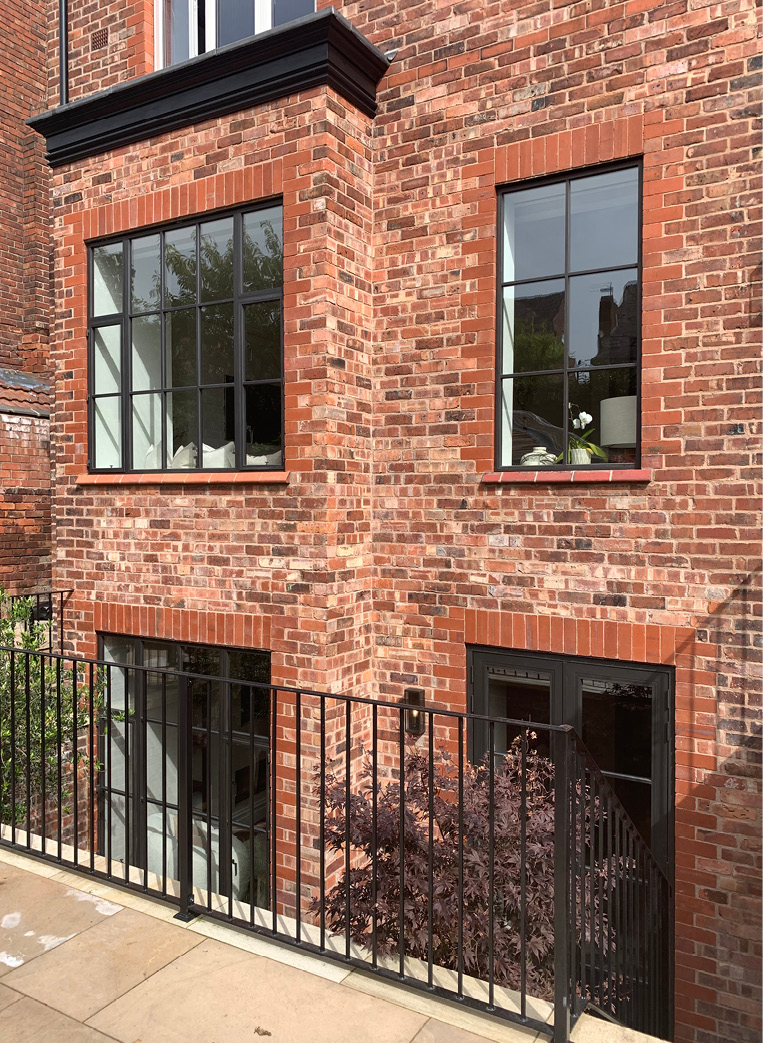 Brick build with bronze windows