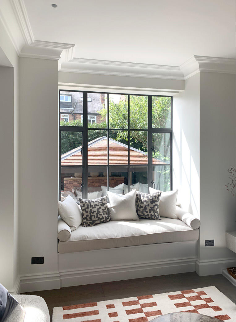 Window seat with bronze windows