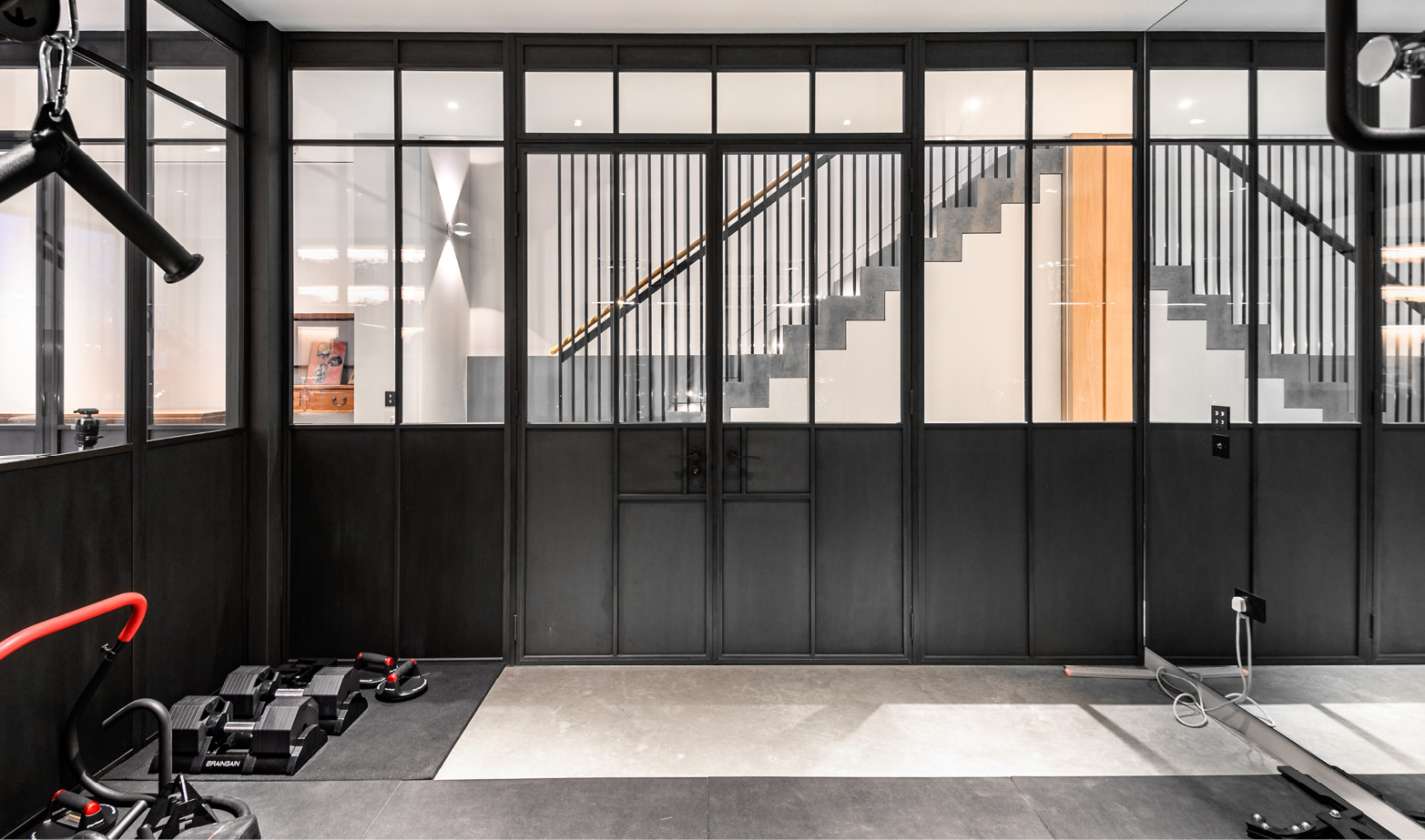 home gym with bronze screens