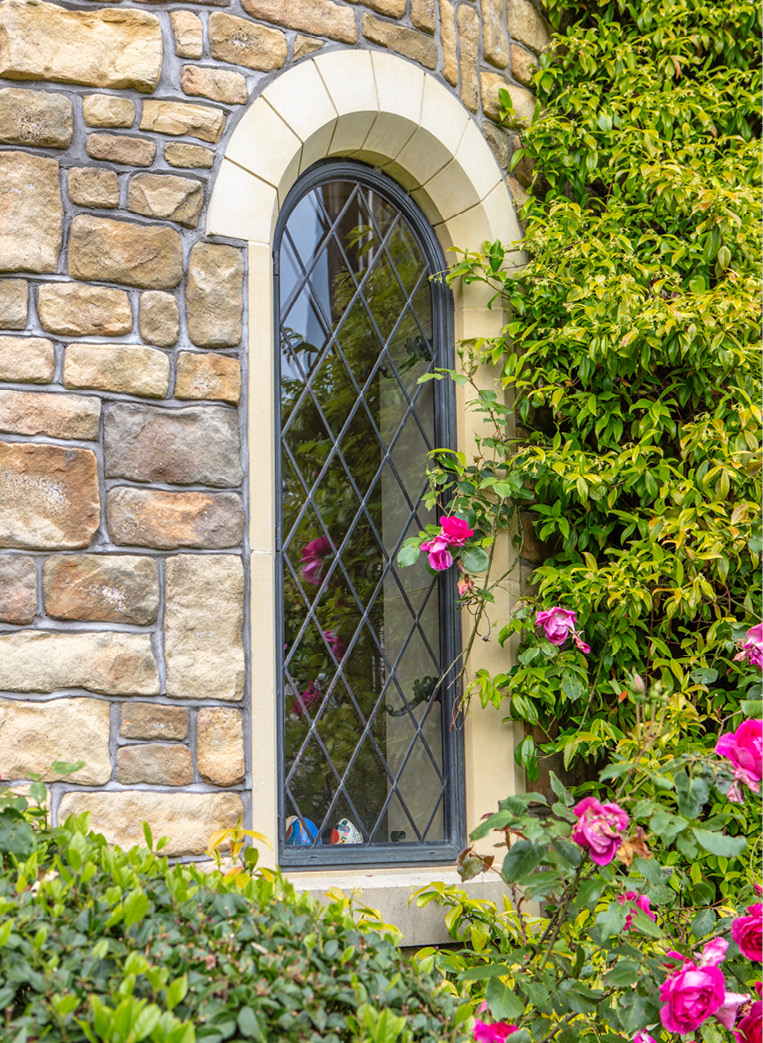 arched leaded metal window