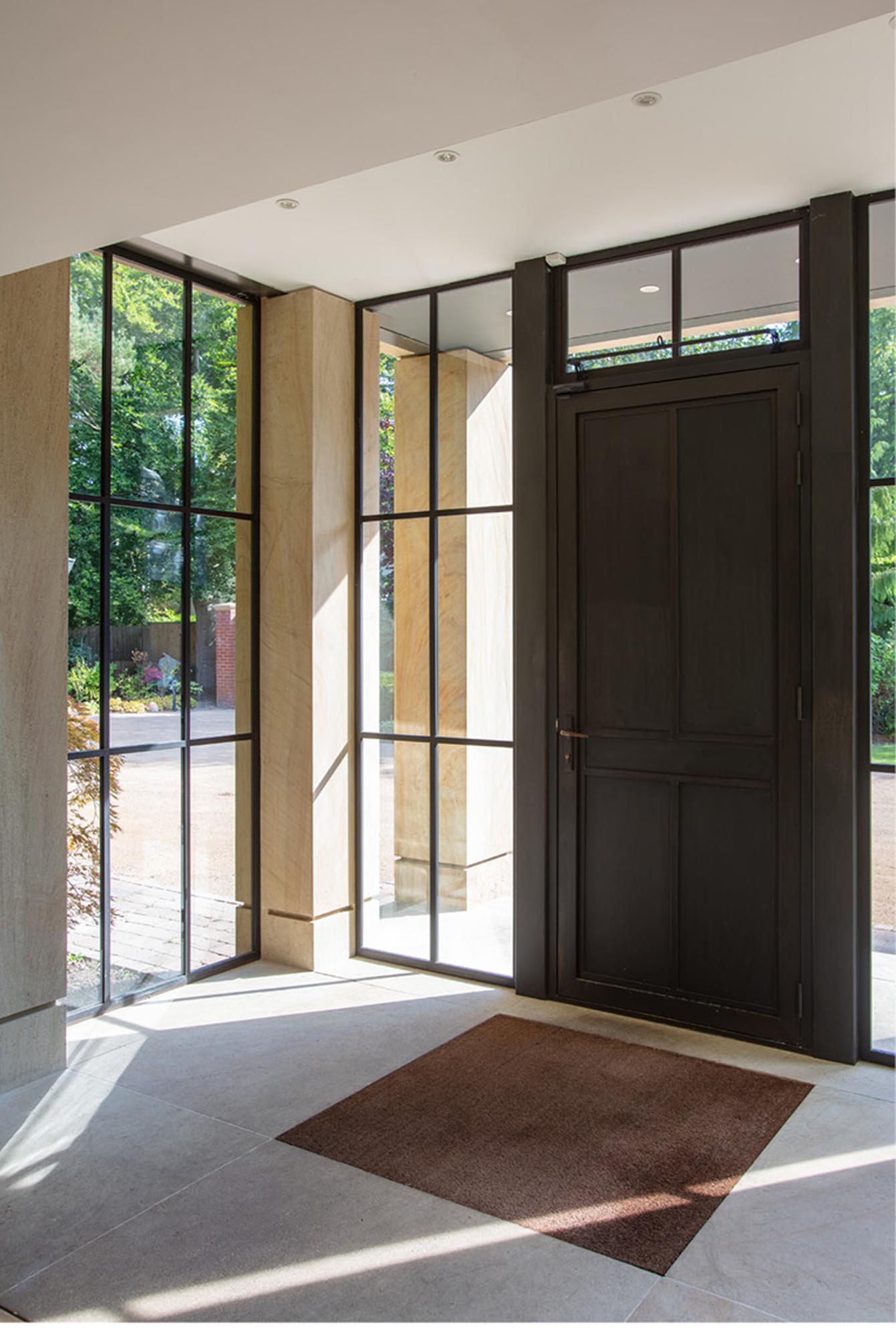 close up of bronze door on entrance porch