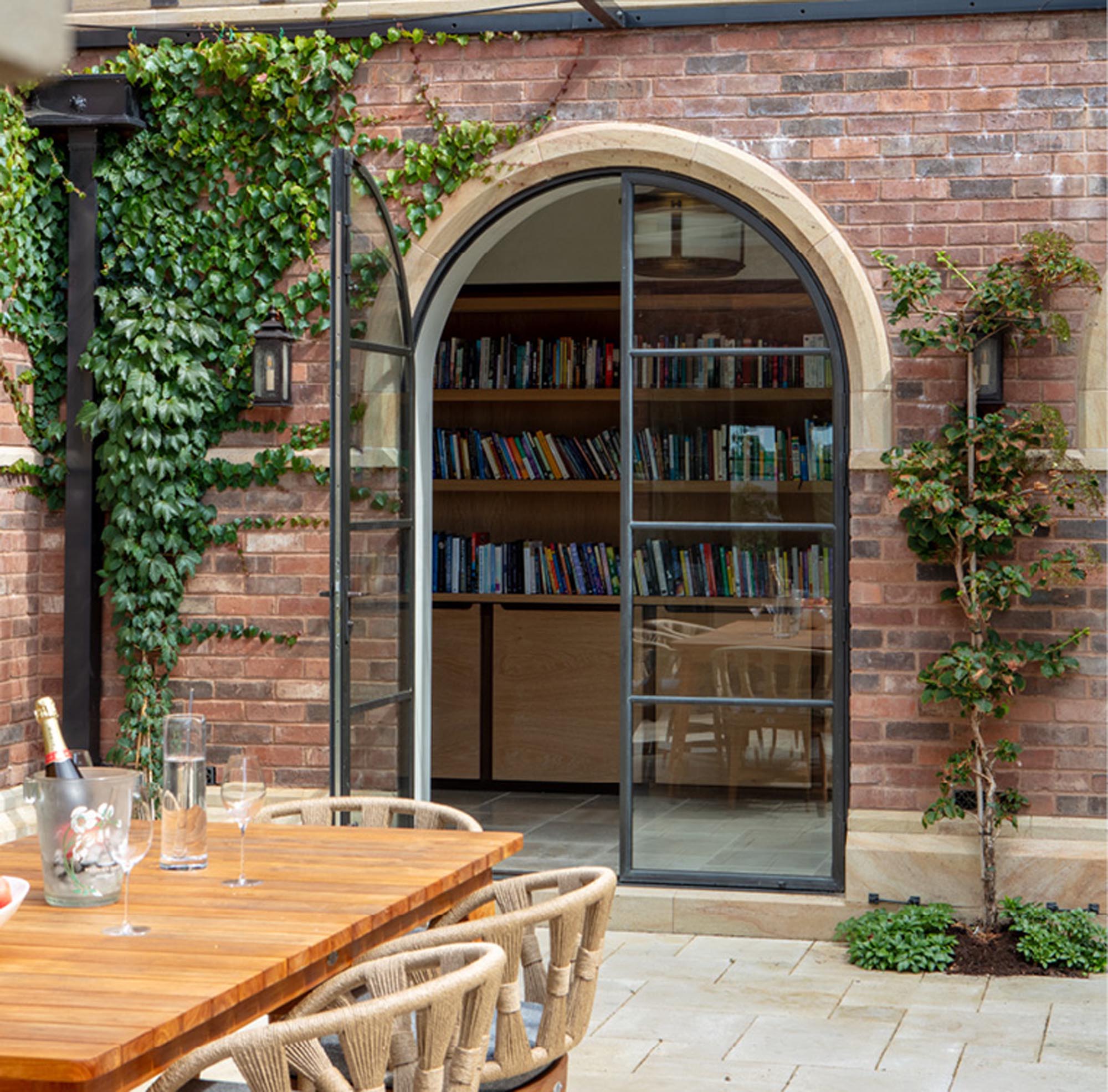 arched open metal doors