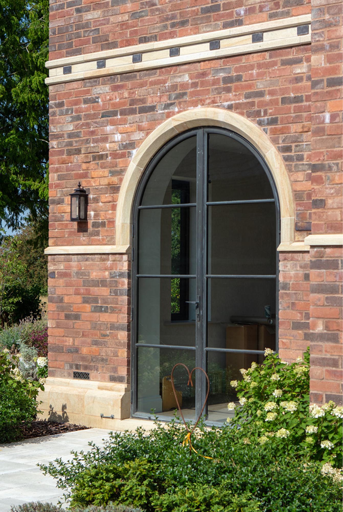 bronze arched door