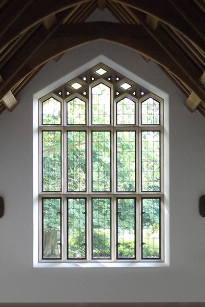 Large Bank of Bronze Windows Using Heritage System