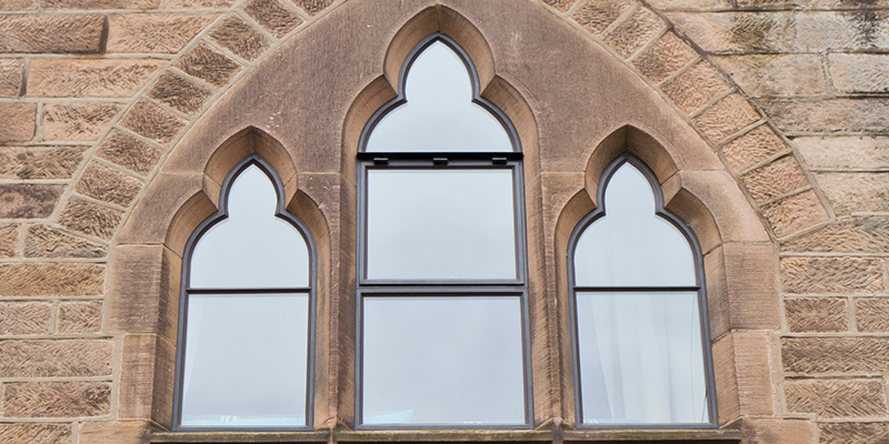 Shaped Listed Bronze Windows