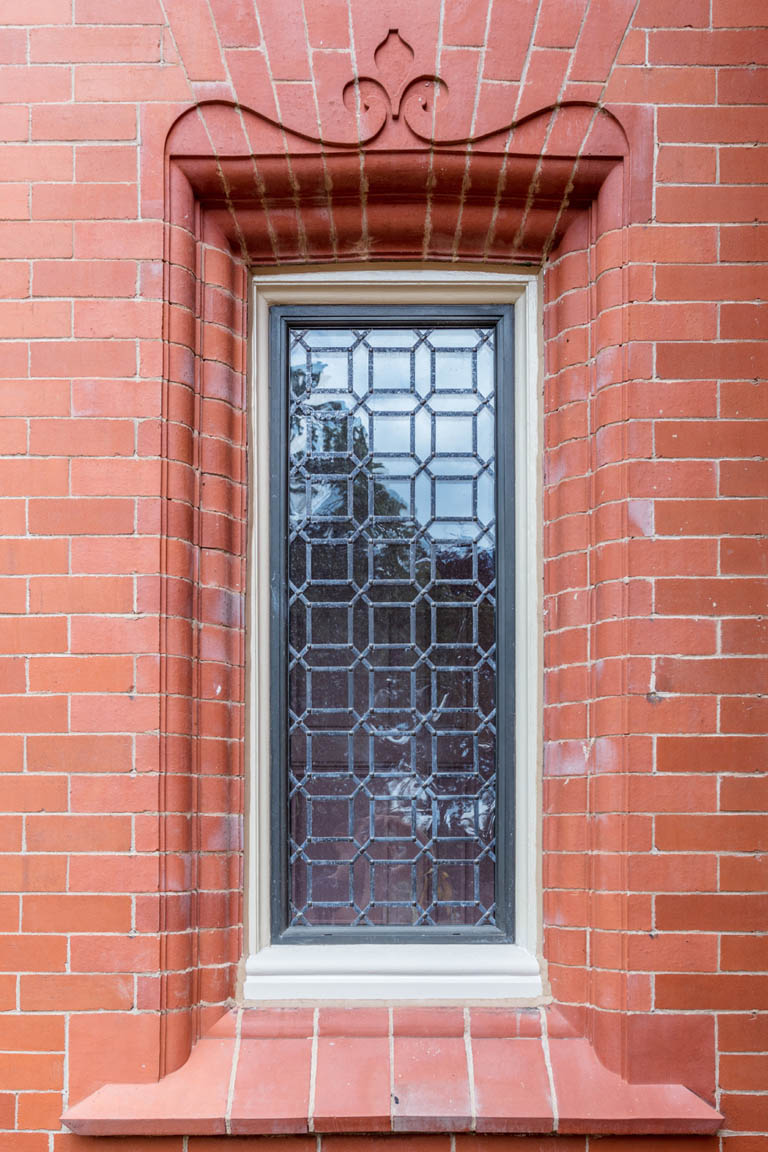 Bronze Window with Detailed Leadwork