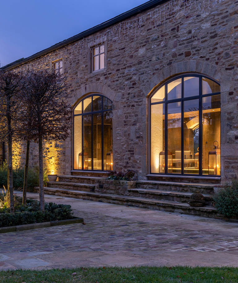 Nighttime Shot of Bronze Doors