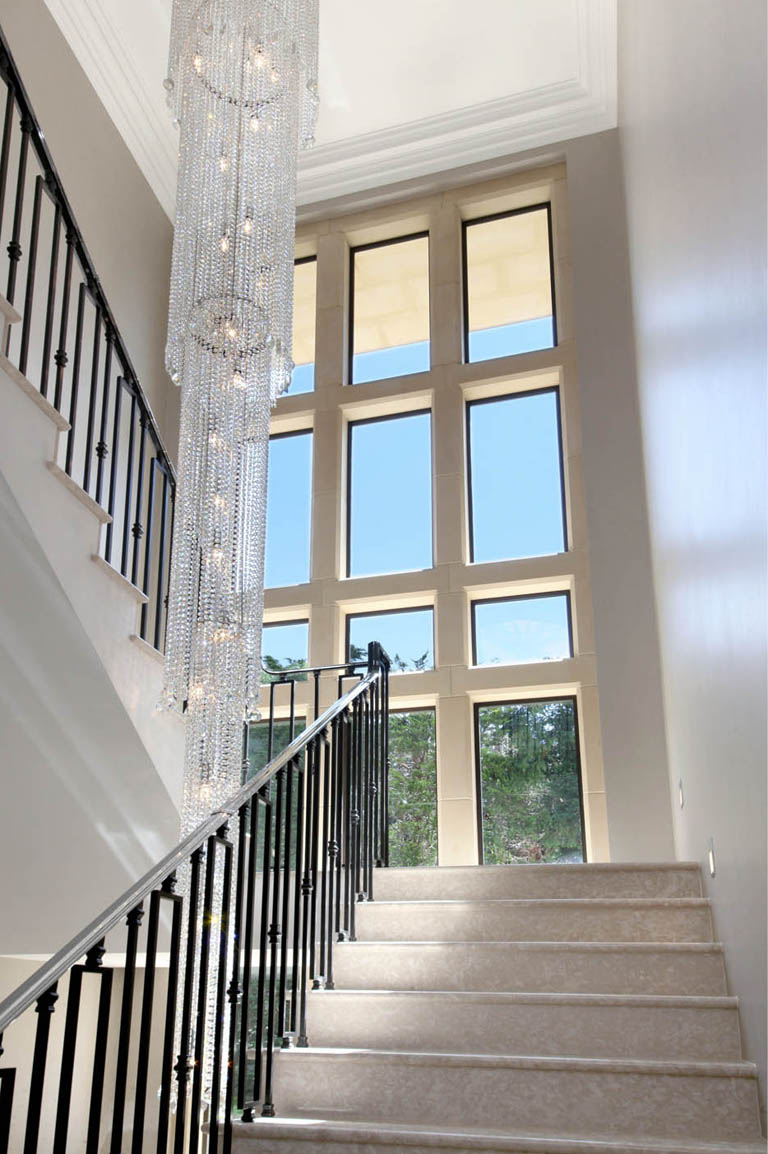 Stairwell with Screen of Bronze Windows