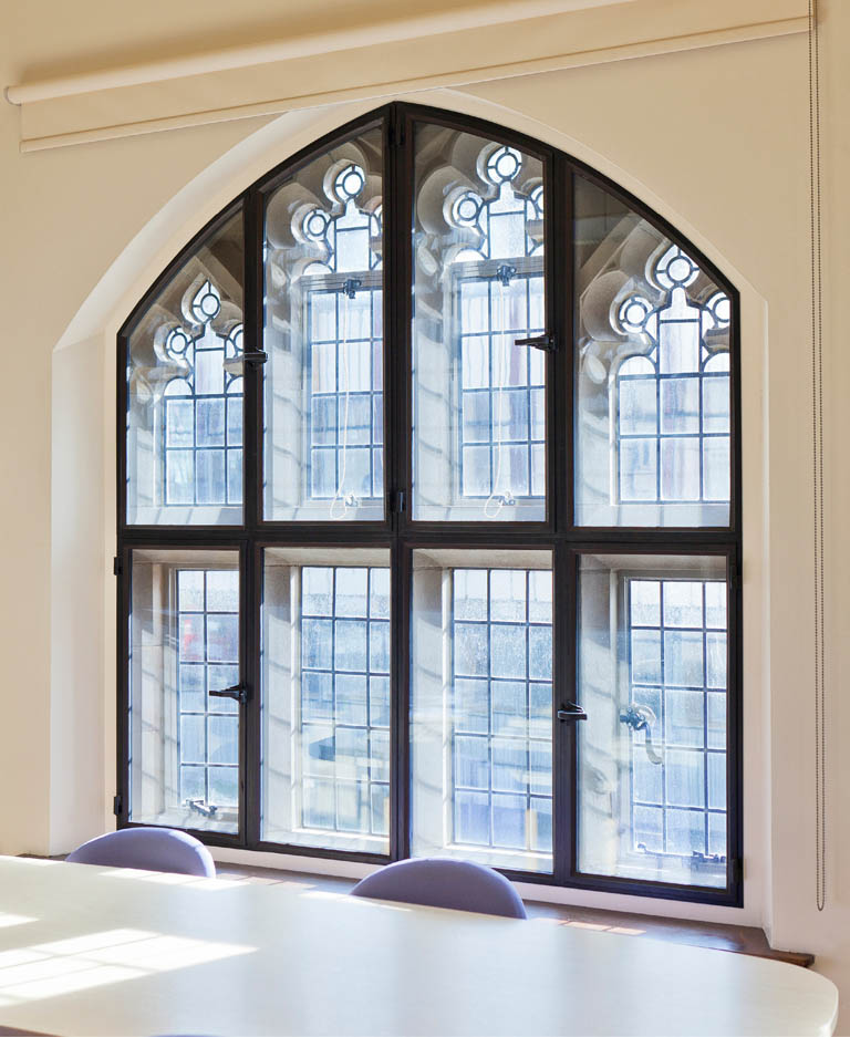 secondary glazing with curved tops